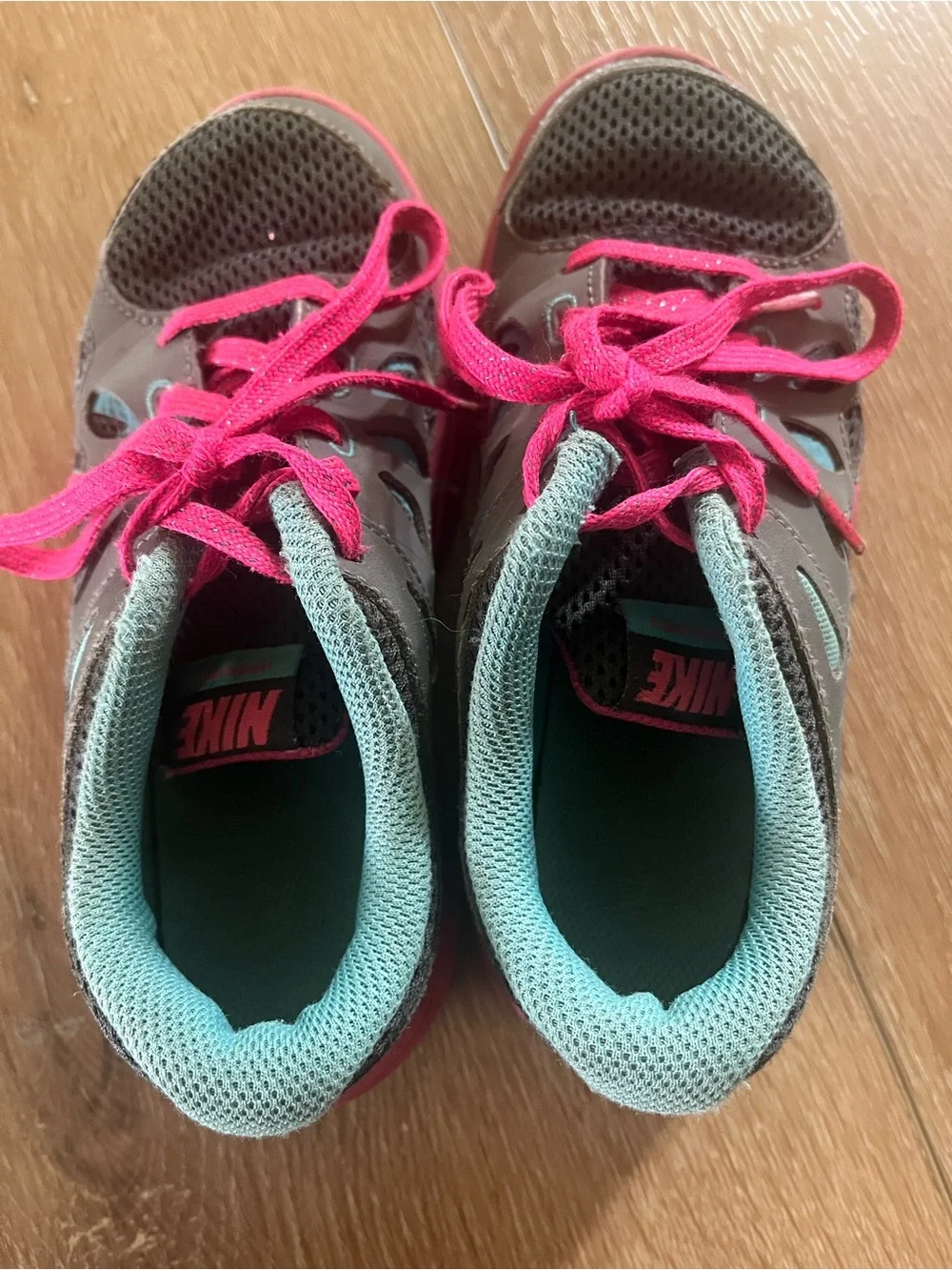 Nike Kids Gray Sneakers with Pink Soles & Teal Logo